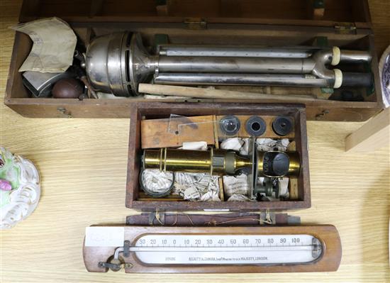 A Negretti & Zambra cased Assmans Psychrometer, a boxed microscope and a thermometer